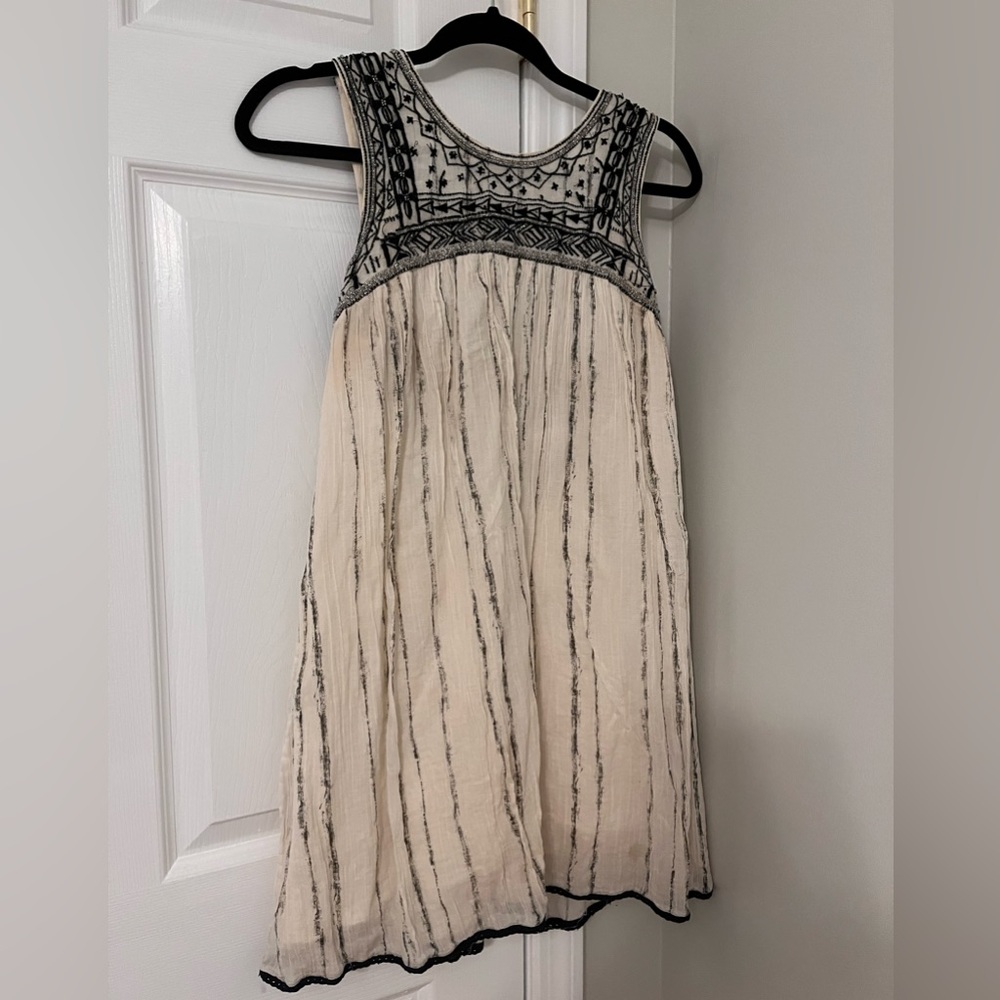 Free people.  Size small.  Gauze cream colored dress.